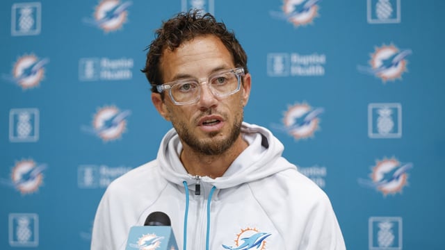 Aug 8, 2025; Lake Forest, IL, USA; Miami Dolphins head coach Mike McDaniel speaks before joint training camp practice with the Chicago Bears ahead of Sunday's preseason opener. Mandatory Credit: Kamil Krzaczynski-Imagn Images