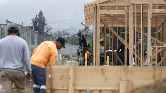 Construction workers build a new home on a property in Altadena, California. Treasury Secretary Scott Bessent has said President Trump might offer tariff exclusions on construction supplies to entice growth in the housing market. (Photo by Mario Tama/Getty Images)