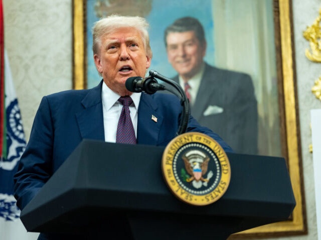 US President Donald Trump speaks in the Oval Office of the White House in Washington, DC, US, on Wednesday, Aug. 6, 2025. Apple Inc. will commit to spend another $100 billion on domestic manufacturing, the latest pledge by the tech giant to increase US production of its products as it seeks to avoid punishing tariffs on its flagship iPhones. Photographer: Bonnie Cash/UPI/Bloomberg via Getty Images