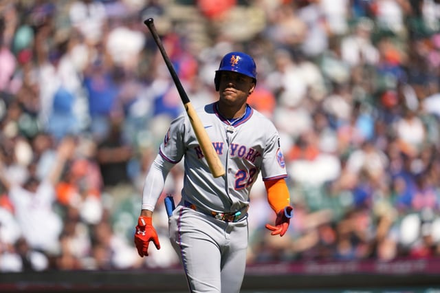 New York Mets' Juan Soto flips his bat after hitting a grand slam against the Detroit Tigers in the fourth inning during a baseball game Monday, Sept. 1, 2025, in Detroit. (AP Photo/Paul Sancya)