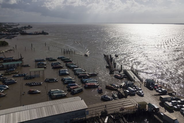 Boats dock on Monday in Parika, on the Essequibo River in Guyana.