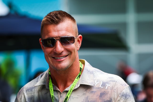 MIAMI, FLORIDA - MAY 2: Rob Gronkowski, a guest of Williams, walks in the paddock during practice/Sprint qualifying ahead of the F1 Grand Prix of Miami at Miami International Autodrome on May 2, 2025 in Miami, Florida.