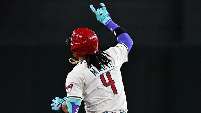 Jul 23, 2025; Phoenix, Arizona, USA; Arizona Diamondbacks second base Ketel Marte (4) celebrates after hitting a solo home run in the first inning against the Houston Astros at Chase Field. Mandatory Credit: Matt Kartozian-Imagn Images