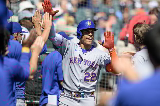 Sep 1, 2025; Detroit, Michigan, USA;  New York Mets right fielder Juan Soto (22) celebrates in the dugout after hitting a grand slam home run against the Detroit Tigers in the fourth inning at Comerica Park. Mandatory Credit: Lon Horwedel-Imagn Images