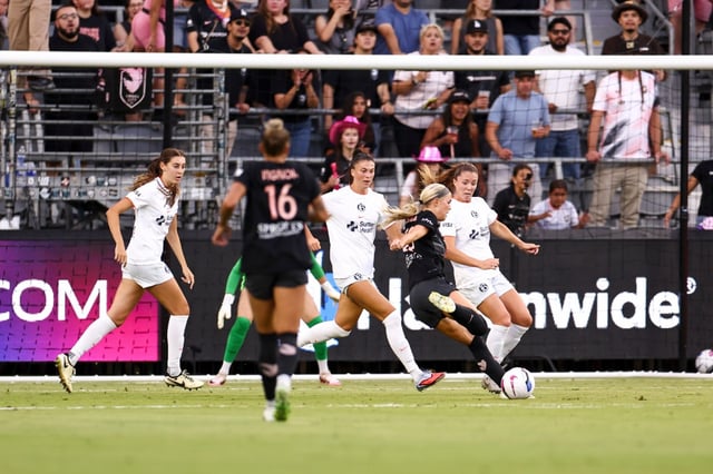 Angel City FC’s Riley Tiernan fires a shot past several Bay FC defenders and scores her team-leading eighth goal in the 12th minute of an NWSL game on Monday, Sept. 1, 2025, at BMO Stadium in Los Angeles. Angel City FC beat Bay FC 2-1.