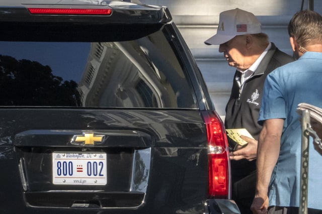 President Donald Trump walks to board the presidential limousine at the White House, Monday, Sept. 1, 2025, in Washington. (AP Photo/Mark Schiefelbein)