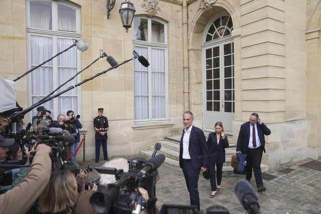 Raphael Glucksmann, co-president of French centre-left party, Place Publique, speaks to media following a meeting with French Prime Minister Francois Bayrou before a confidence vote, at the Hotel Matignon in Paris Tuesday, Sept. 2, 2025. (AP Photo/Thibault Camus)