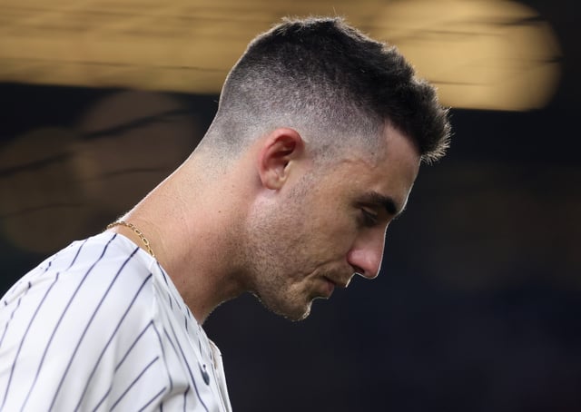 NEW YORK, NEW YORK - AUGUST 12: Cody Bellinger #35 of the New York Yankees stands on the field during a pitching change against the Minnesota Twins at Yankee Stadium on August 12, 2025 in the Bronx borough of New York City. (Photo by Elsa/Getty Images)