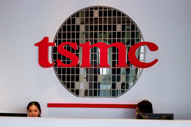 A TSMC logo is displayed on a wall in Hsinchu, Taiwan April 15, 2025. REUTERS/Ann Wang/ File Photo