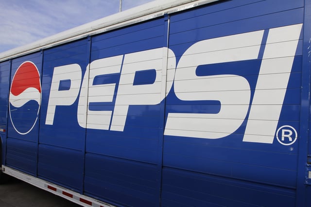 FILE - In this May 30, 2012, file photo, a Pepsi logo is seen on a delivery truck in Springfield, Ill. PepsiCo Inc. on Thursday, July 9, 2015, reported second-quarter net income of $1.98 billion. (AP Photo/Seth Perlman, File)