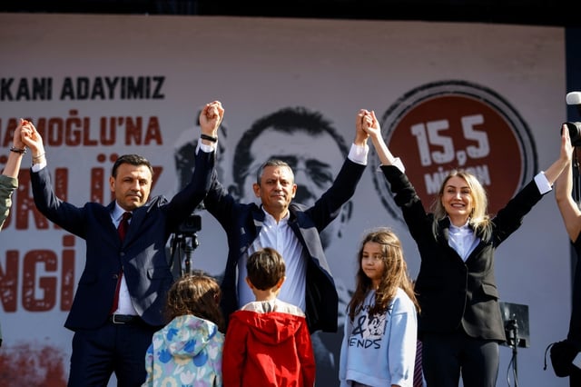 Istanbul's provincial leader Ozgur Celik, seen on the left holding the hands of CHP leader Ozgur Ozel and Dilek Kaya, wife of jailed Istanbul mayor Ekrem Imamoglu, was removed from his position by the court ruling