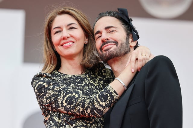 U.S. designer Marc Jacobs and Director Sofia Coppola pose on the red carpet for the screening of the movie "Marc by Sofia" out of competition, at the 82nd Venice Film Festival, in Venice, Italy, September 2, 2025. REUTERS/Yara Nardi