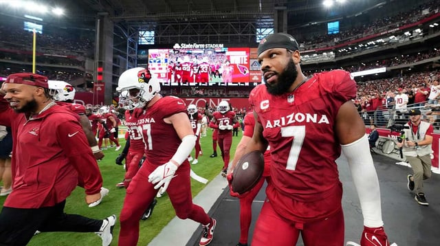 Arizona Cardinals linebacker Kyzir White (7) holds onto the ball after intercepting a Dallas Cowboys pass in the end zone in the second half at State Farm Stadium in Glendale on Sept. 24, 2023.

Rob Schumacher/The Republic / USA TODAY NETWORK via Imagn Images
