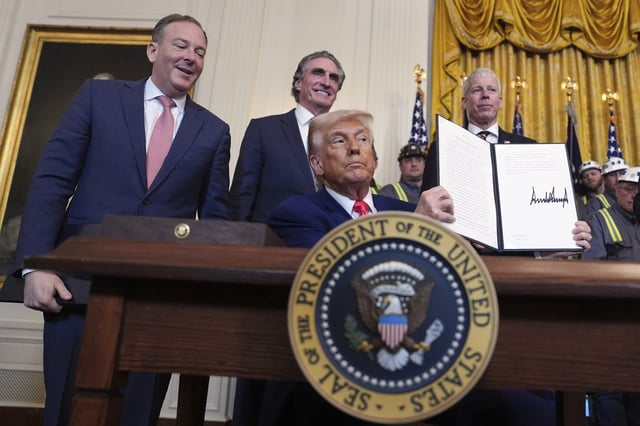 President Donald Trump holds a signed an executive order during an event in the East Room of the White House, April 8, 2025, in Washington, as from left Environmental Protection Agency director Lee Zeldin, Interior Secretary Doug Burgum and Energy Secretary Chris Wright watch.