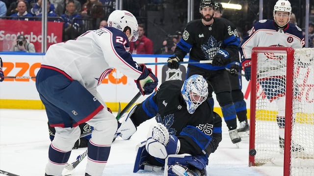 Jan 22, 2025; Toronto, Ontario, CAN; Columbus Blue Jackets left wing James van Riemsdyk (21) scores a goal on Toronto Maple Leafs goaltender Dennis Hildeby (35) during the second period at Scotiabank Arena. Mandatory Credit: Nick Turchiaro-Imagn Images