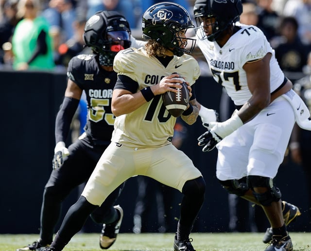 Colorado quarterback Julian Lewis (10) look to throw during the team's spring game at Folsom Field.