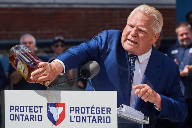 Ontario Premier Doug Ford empties a Crown Royal bottle of whisky at a press conference in Kitchener, Ont., on Tuesday, Sept. 2, 2025. Ford criticized  the popular whisky's parent company, Diageo, for their plan to close one of their Ontario bottling plants in the coming months.
