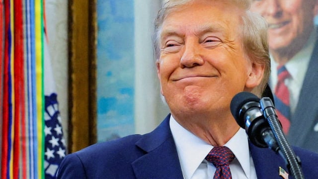 U.S. President Donald Trump smiles as he attends an event to announce that Space Force Command will move from Colorado to Alabama.