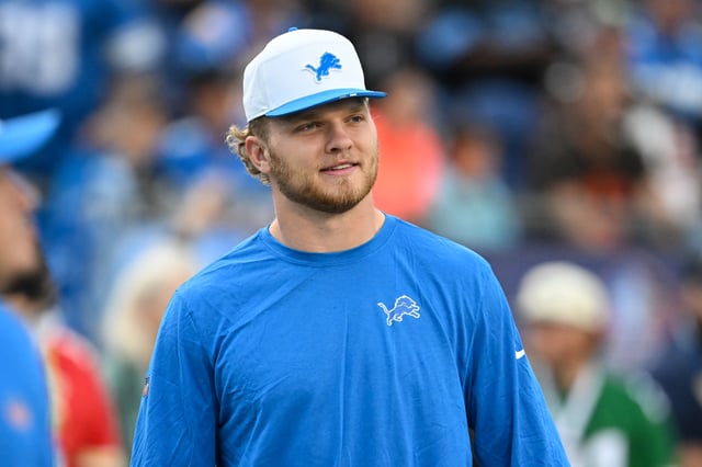 Aidan Hutchinson #97 of the Detroit Lions looks on prior to the 2025 Pro Football Hall of Fame Game against the Los Angeles Chargers at Tom Benson Hall of Fame Stadium on July 31, 2025 in Canton, Ohio.