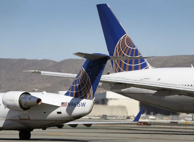 United Airlines planes pass each other at SFO in San Francisco. Two United Airlines flights faced unrelated problems at San Francisco International Airport within 24 hours, one after a ground collision and another forced to return mid-flight over a cabin odor.