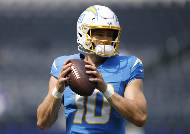 INGLEWOOD, CALIFORNIA - AUGUST 16: Justin Herbert #10 of the Los Angeles Chargers warms up before the NFL Preseason 2025 game between Los Angeles Chargers and Los Angeles Rams at SoFi Stadium on August 16, 2025 in Inglewood, California. (Photo by Harry How/Getty Images)