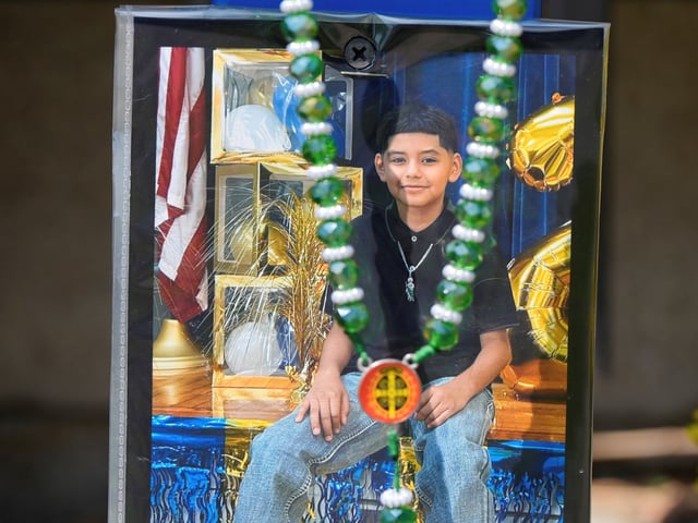 A makeshift memorial for 11-year-old Julian Guzman, who was shot and killed during a doorbell prank, is shown Tuesday, Sept. 2, 2025, in Houston. (AP Photo/David J. Phillip)