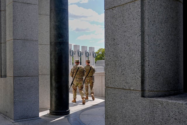 Members of the West Virginia National Guard patrol the World War II Memorial in Washington, DC, on August 27.