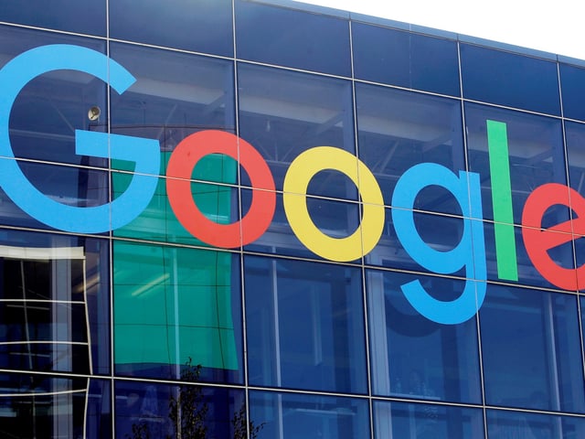 FILE - A sign is displayed on a Google building at their campus in Mountain View, Calif., Sept. 24, 2019. (AP Photo/Jeff Chiu, File)