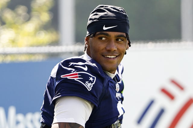 FOXBOROUGH, MA - JULY 28: Christian Gonzalez #0 of the New England Patriots smiles during training camp at Gillette Stadium on July 28, 2025 in Foxborough, Massachusetts.