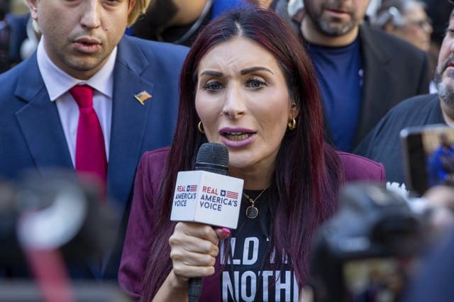 Right-wing activist Laura Loomer is in front of the courthouse where the hush-money trial of Donald Trump got underway Monday, April 15, 2024, in New York