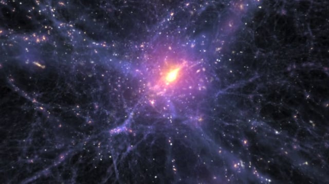 This visualization shows galaxies, composed of gas, stars and dark matter, colliding and forming filaments in the large-scale universe providing in a view of the Cosmic Web.