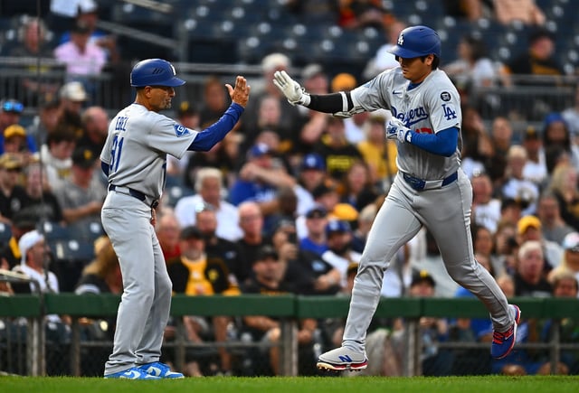 PITTSBURGH, PENNSYLVANIA - SEPTEMBER 2: Shohei Ohtani #17 of the Los Angeles Dodgers celebrates his solo home run with third base coach Dino Ebel #91 during the third inning against the Pittsburgh Pirates at PNC Park on September 2, 2025 in Pittsburgh, Pennsylvania. (Photo by Joe Sargent/Getty Images)