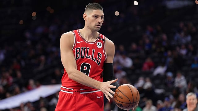 Apr 13, 2025; Philadelphia, Pennsylvania, USA; Chicago Bulls center Nikola Vucevic (9) receives a pass against the Philadelphia 76ers in the first quarter at Wells Fargo Center. Mandatory Credit: Kyle Ross-Imagn Images