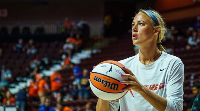 Aug 17, 2025; Uncasville, Connecticut, USA; Indiana Fever guard Sophie Cunningham (8) warms up before the start of the game against the Connecticut Sun at Mohegan Sun Arena. Mandatory Credit: David Butler II-Imagn Images.