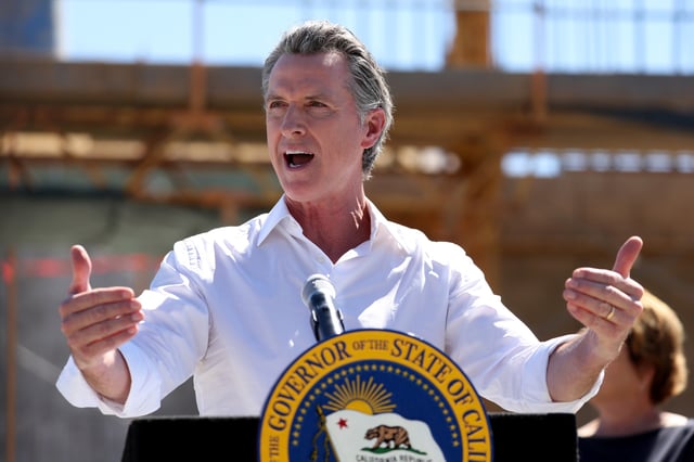 California Governor Gavin Newsom speaks to reporters in Antioch, California on August 11, 2022.