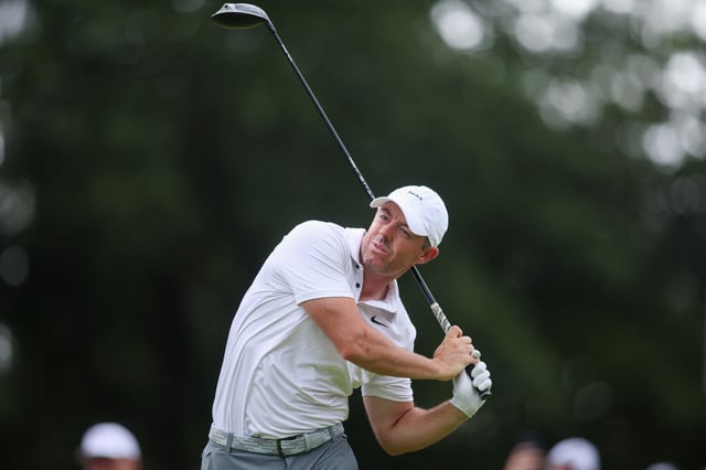  Aug 23, 2025; Atlanta, Georgia, USA; Rory McIlroy reacts after his shot from the 18th tee during the third round of the TOUR Championship golf tournament. Mandatory Credit: Brett Davis-Imagn Images/ File Photo