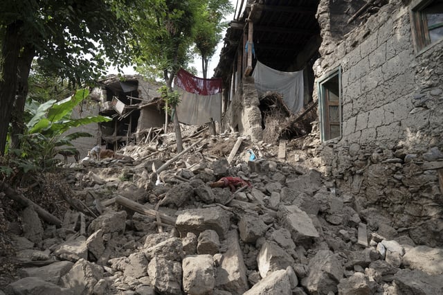 A village lies in rubble after Sunday night's powerful 6.0-magnitude earthquake that struck several provinces, in a remote valley in Kunar province, Afghanistan, Tuesday, Sept. 2, 2025. (AP Photo/Nava Jamshidi)