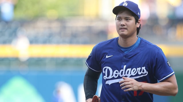 Sep 2, 2025; Pittsburgh, Pennsylvania, USA; Los Angeles Dodgers two-way player Shohei Ohtani (17) jogs in from the outfield before the game against the Pittsburgh Pirates at PNC Park. Mandatory Credit: Charles LeClaire-Imagn Images