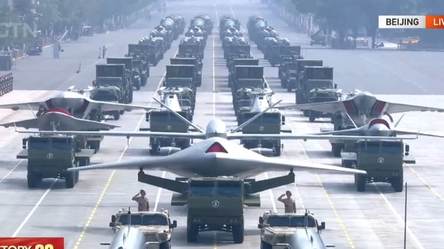 Screengrab showing the front view of the six truck-mounted UCAVs during the parade. (Image credit: CGTN)