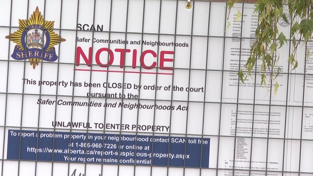 A sign posted outside a Lethbridge drug house explains that it  has been shut down by the Alberta Sheriff's Safer Communities and Neighbourhoods (SCAN) unit.