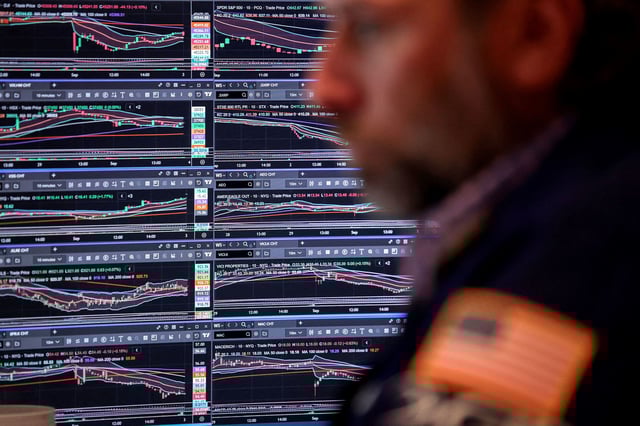 A trader works on the floor at the New York Stock Exchange on September 3, 2025.