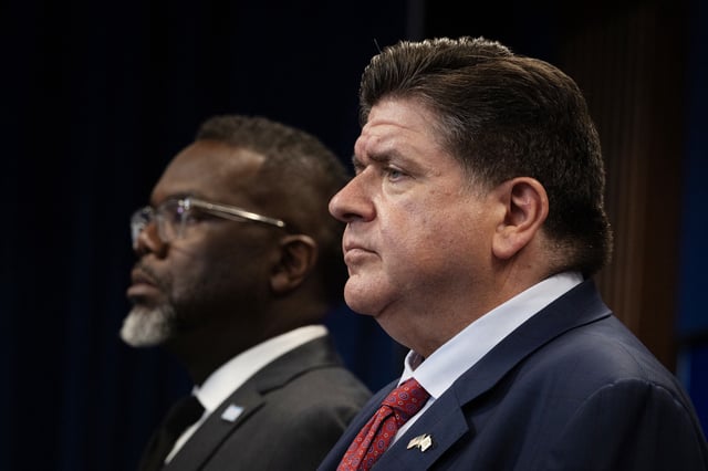 Chicago Mayor Brandon Johnson and Illinois Governor JB Pritzker in Chicago on Tuesday.