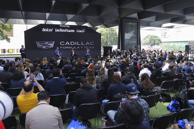 Driver Sergio Perez (C) addresses the media after announcing his return to Formula 1 at Teatro Telcel on August 27, 2025 in Mexico City, Mexico. Sergio "Checo" Perez will join Cadillac Formula 1 Team in 2026 as one of the drivers alongside Valtteri Botas. Perez has raced for 14 seasons as part of Sauber, Force India, Racing Point and Red Bull teams.