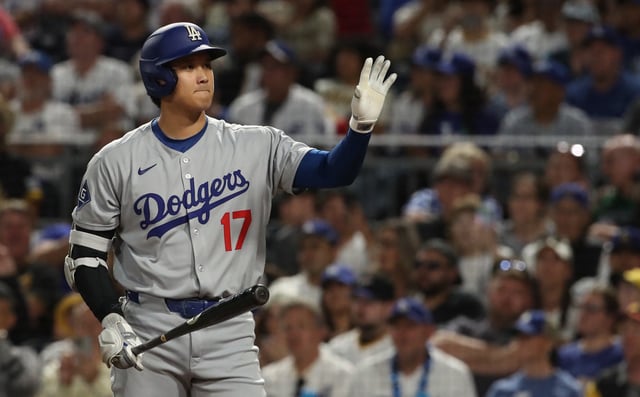 Sep 2, 2025; Pittsburgh, Pennsylvania, USA;  Los Angeles Dodgers two-way player Shohei Ohtani (17) asks for time-out in his at bat against the Pittsburgh Pirates during the seventh inning at PNC Park. Mandatory Credit: Charles LeClaire-Imagn Images