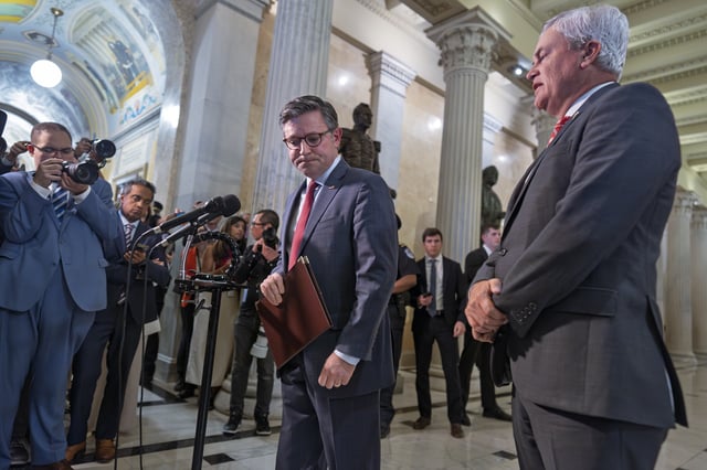 Speaker of the House Mike Johnson, R-La., and House Oversight Committee Chairman James Comer, R-Ky., right, talk to reporters after a closed-door meeting with victims in the Jeffrey Epstein sex trafficking case investigation, at the Capitol in Washington, Tuesday, Sept. 2, 2025. (AP Photo/J. Scott Applewhite)