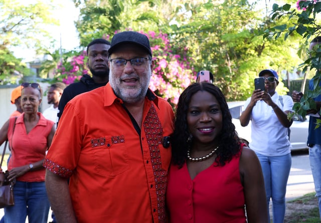 Mark Golding, opposition leader and candidate for prime minister, and his wife Sandra Golding arrive at a polling station to cast their votes in the general election, in Kingston, Jamaica September 3, 2025. REUTERS/Gilbert Bellamy