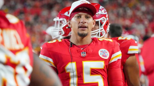 Aug 22, 2025; Kansas City, Missouri, USA; Kansas City Chiefs quarterback Patrick Mahomes (15) on the sidelines against the Chicago Bears during the first half of the game at GEHA Field at Arrowhead Stadium. Mandatory Credit: Denny Medley-Imagn Images