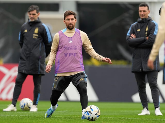 Argentina's Lionel Messi passes the ball during a training session ahead of a World Cup 2026 qualifying soccer match against Venezuela, at the Argentina Soccer Association in Buenos Aires, Argentina, Tuesday, Sept. 2, 2025. (AP Photo/Gustavo Garello)