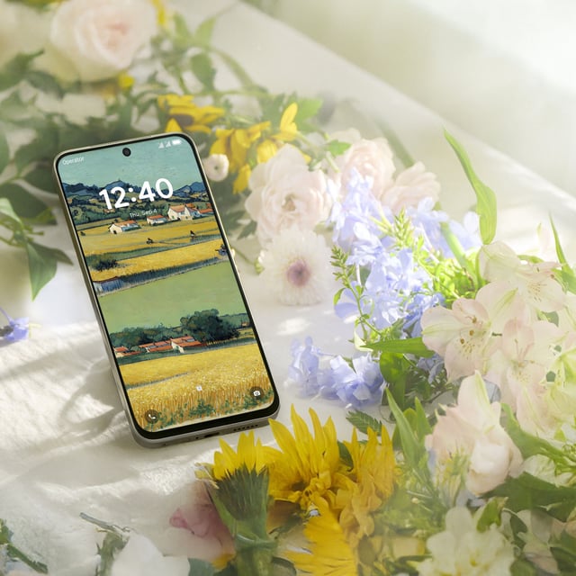 The TCL NXTPAPER 60 Ultra in a cluster of flowers.