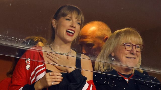 Donna Kelce faced backlash for unintentionally reposting a comedian's video about Taylor Swift's desire to have a baby with her son. (Photo by David Eulitt / GETTY IMAGES NORTH AMERICA / Getty Images via AFP)